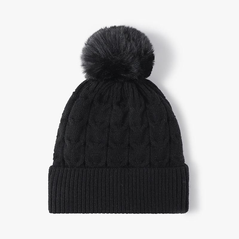 Black plush lined cable knit pom beanie