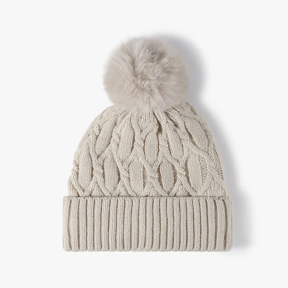 Beige cable knit pom-pom cuffed beanie product view