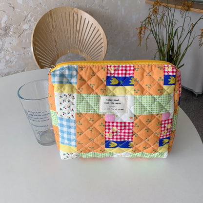 Cosbai floral storage purse cosmetic bag with zipper pull visible on top