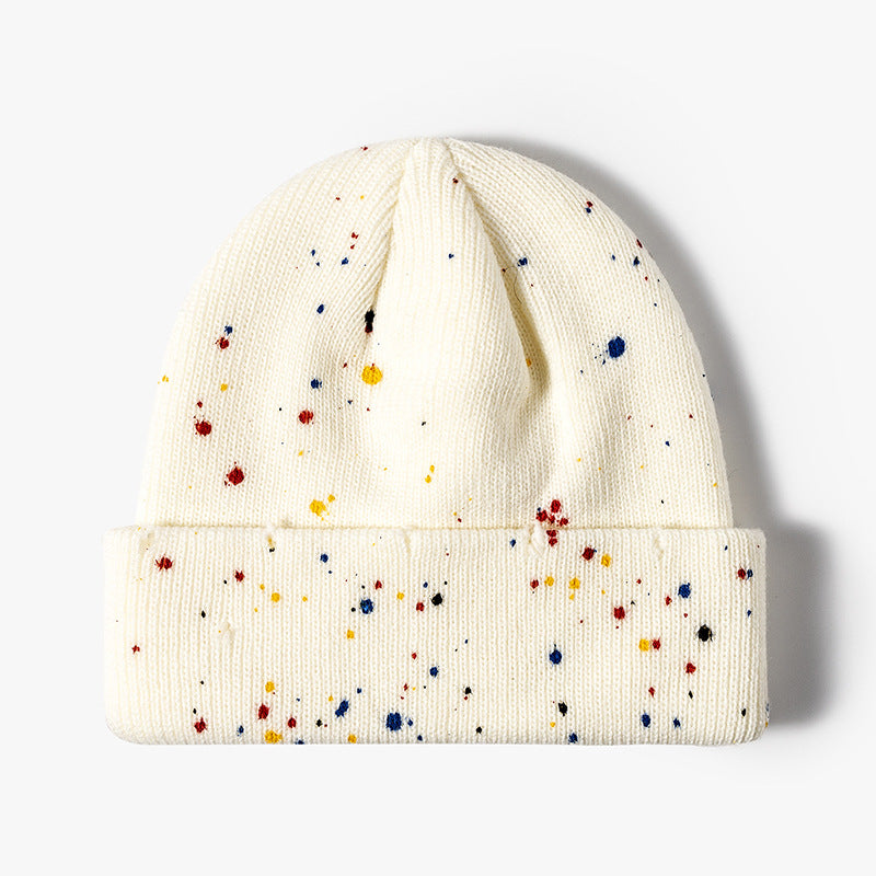 Ivory paint splatter cuffed knit beanie product view