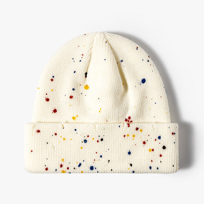 Ivory paint splatter cuffed knit beanie product view