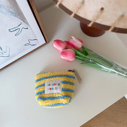 Cosbai Mini Plush Makeup Bag in pink, top view showing zipper placement