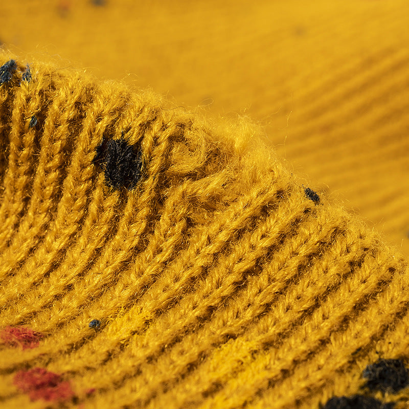 Yellow paint splatter cuffed knit beanie detail
