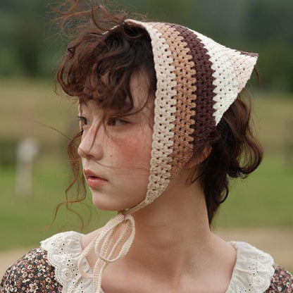 Close-up of Scarvii crochet striped hairband showing detailed stitching and color pattern