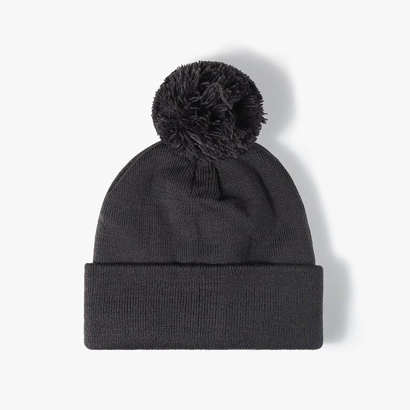 Gray plush lined pom cuffed knit beanie product view