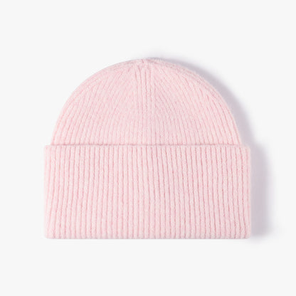 Pink fuzzy ribbed wide cuff knit beanie product view