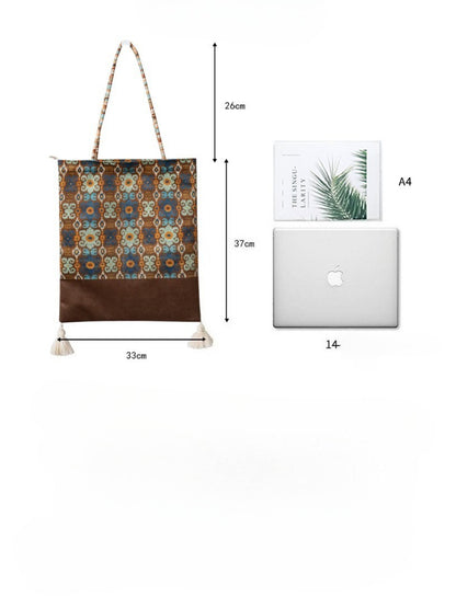 Cosbai Boho Ethnic Tassel Tote bag with colorful ethnic design and tassels shown close-up