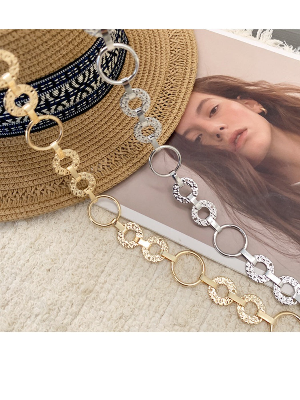 Beco pendant chain waist belt with clasp detail on a white background
