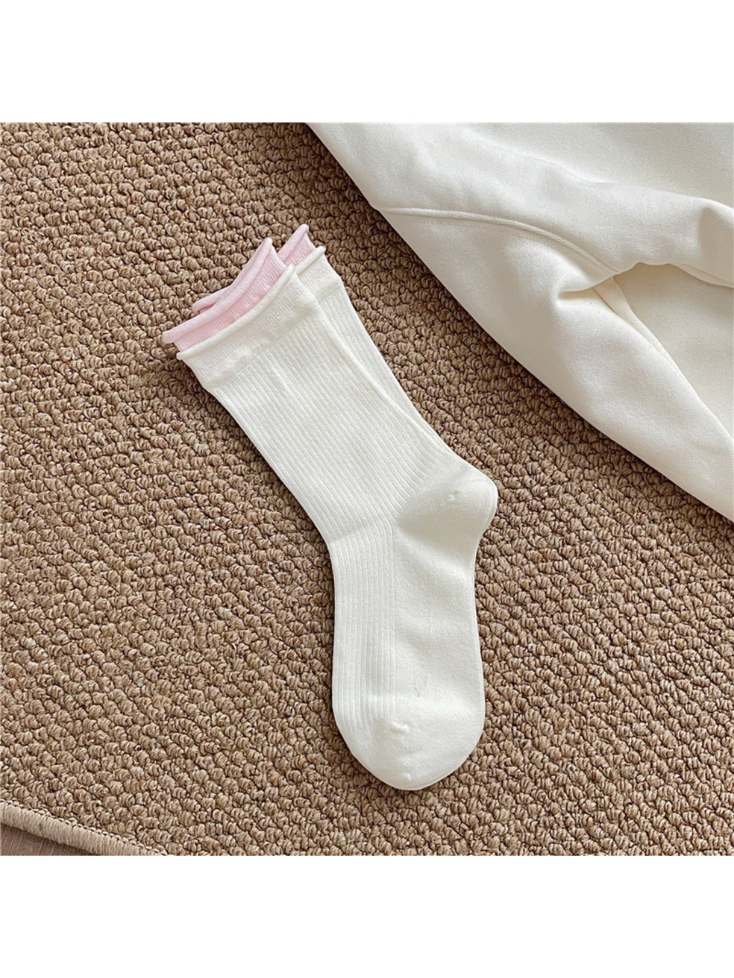 Rufia casual roll cuff crew socks worn on feet with rolled cuffs visible