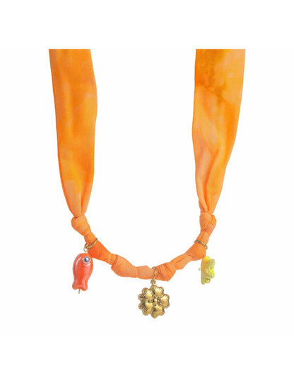 Neckit Summer Charm fabric necklace coiled to show fabric pattern and charm details