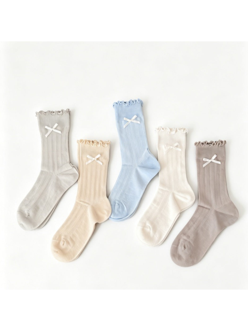 Pair of Rufia soft bow frill crew socks in light pink with delicate bow detail