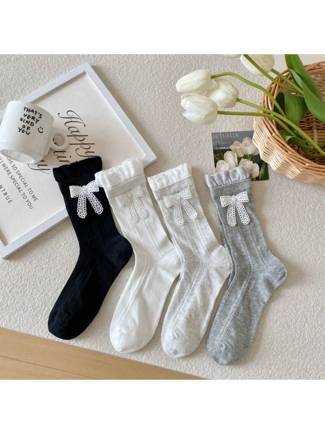 Rufia Sweet Ribbon Trim Crew Socks in white with pink ribbon detail