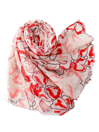Model wearing Pink Petal Statement Scarf styled around the neck with a casual outfit