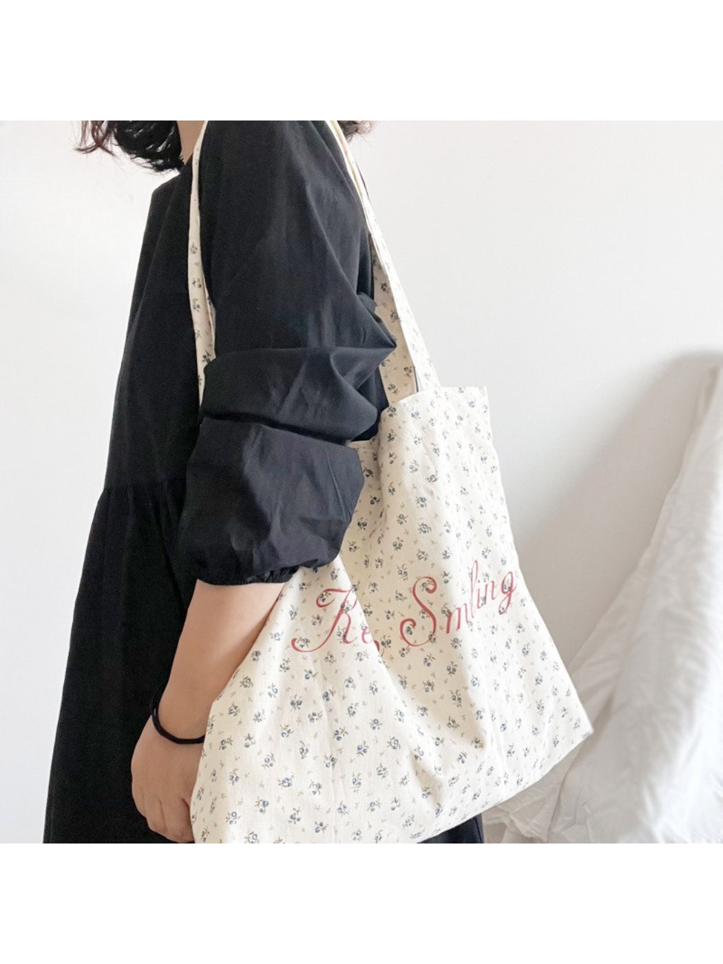 Close-up of floral design and lettering on Cosbai vintage tote bag showing detailed print