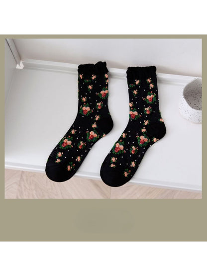 Model wearing Rufia vintage rose floral crew socks paired with casual shoes