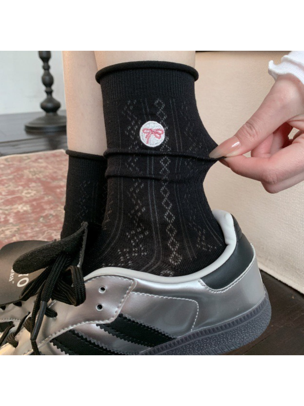 Rufia casual bow knit socks in cream color paired with casual shoes