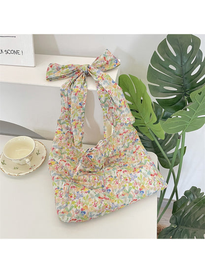 Side view of Cosbai Ditsy Floral Bow Strap Tote Bag showing strap and floral design