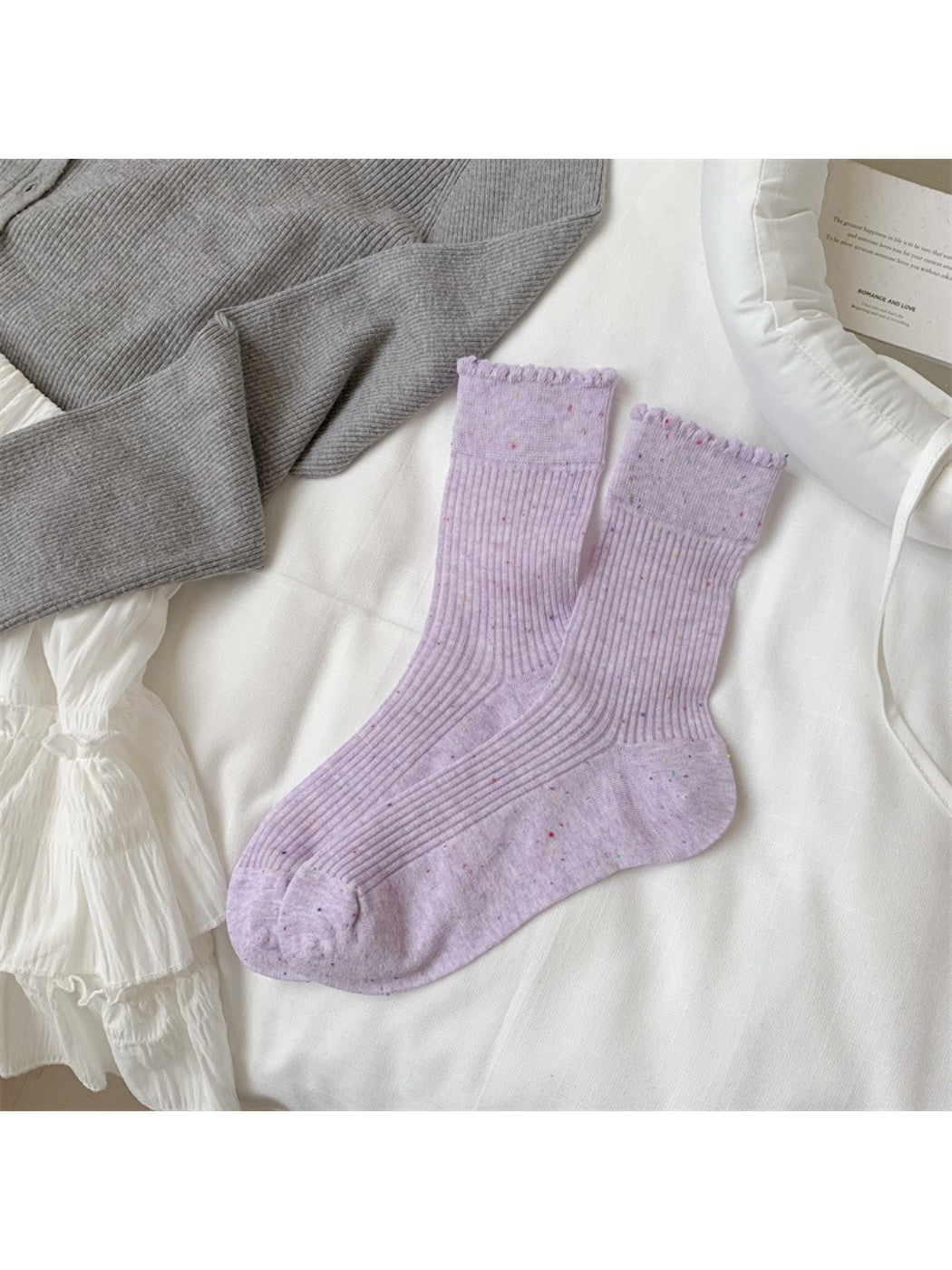 Flat lay of Rufia rib crew socks with focus on knit detail and ribbing