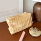 Cosbai pastel plaid cosmetic bag displayed on flat surface highlighting shape