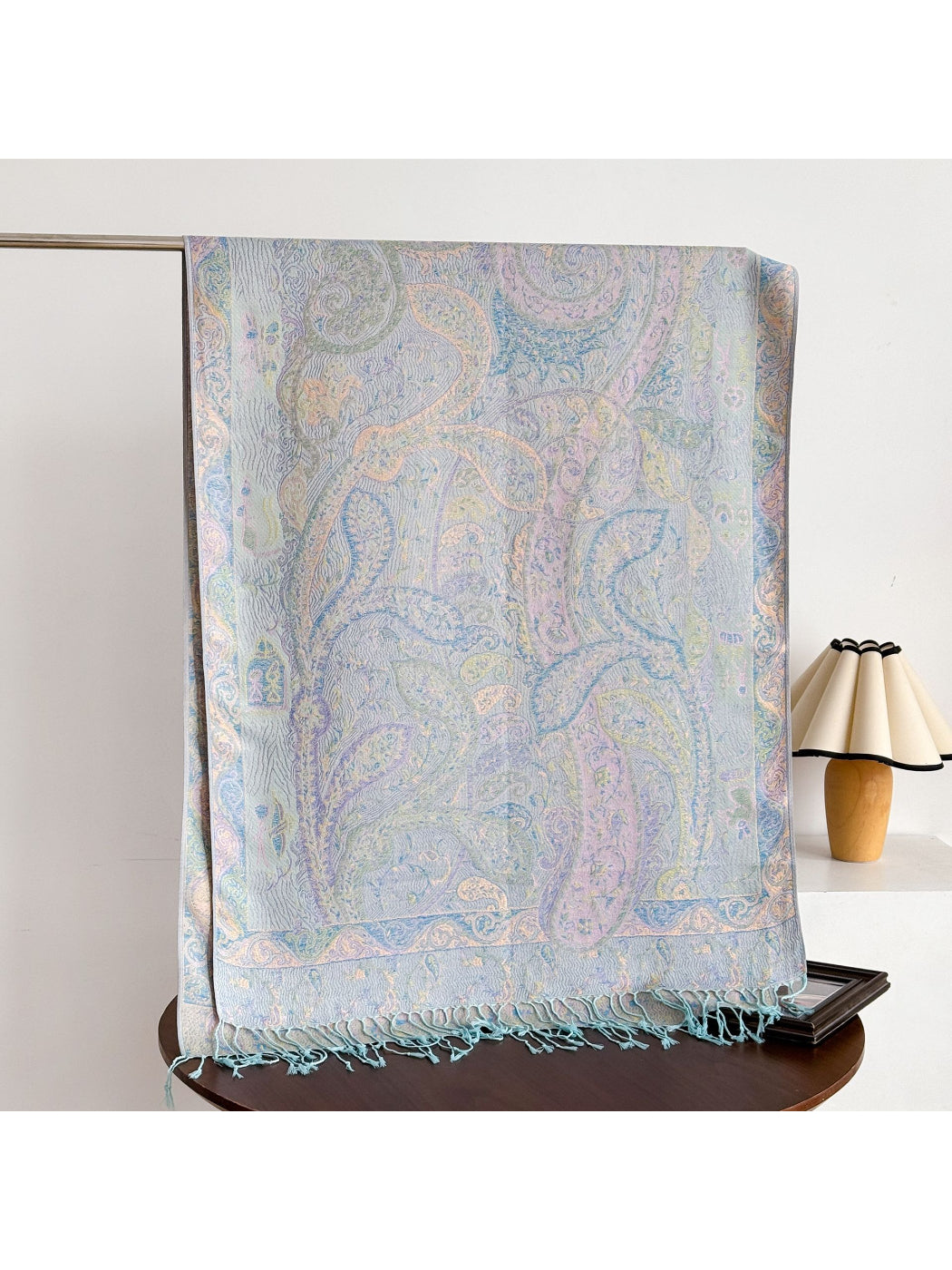 Detail of fringed edges on bohemian paisley shawl