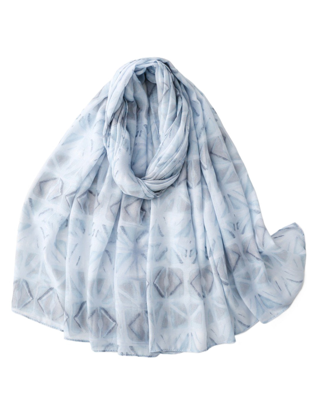 Scarvii Soft Geo Scarf styled with casual outfit on wooden surface
