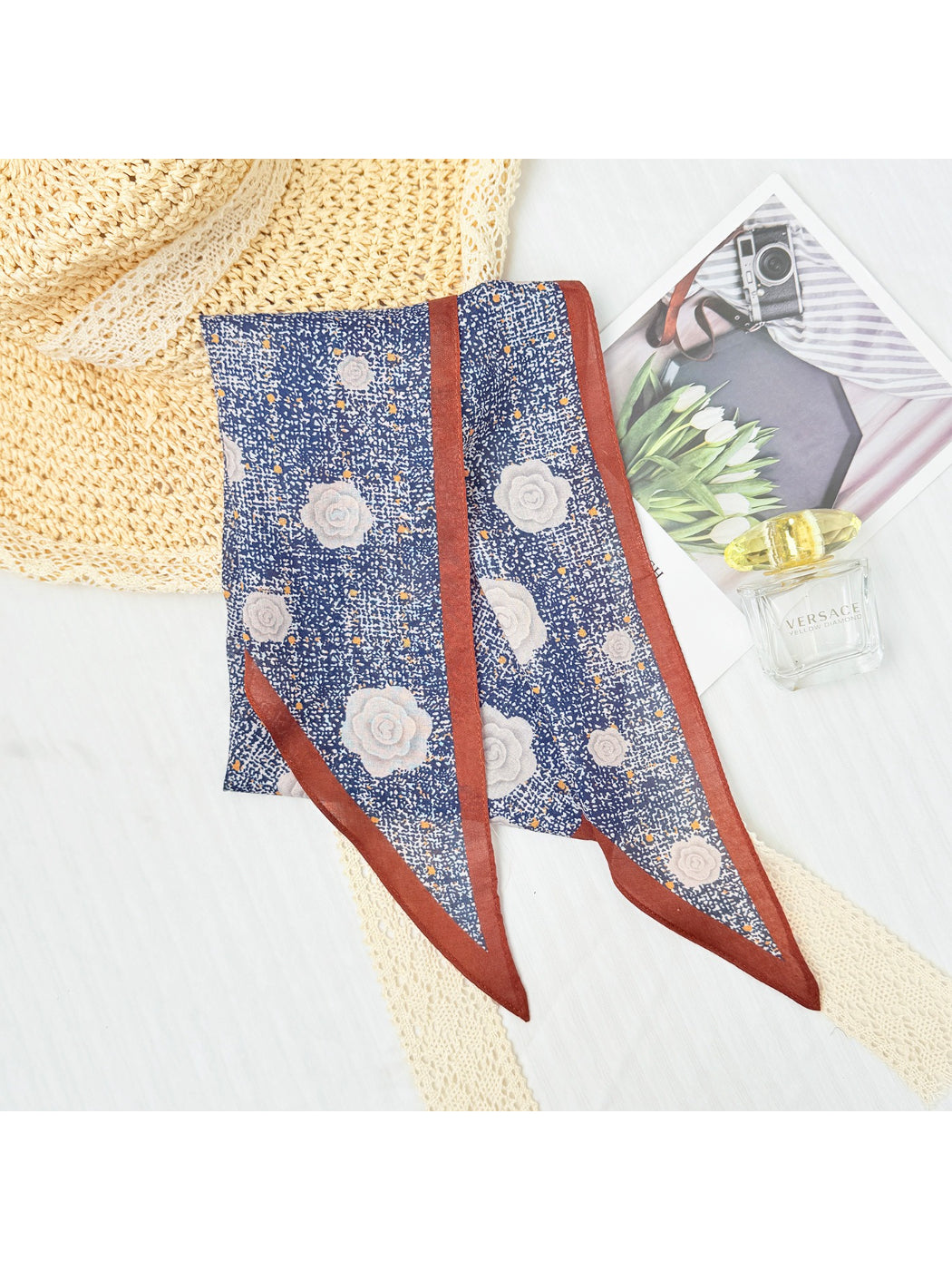 Mini rose triangle scarf styled as a headband on model