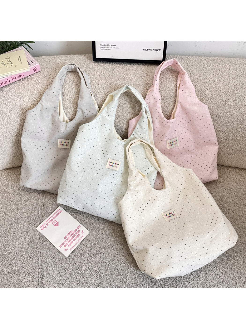 Cosbai soft polka dot shoulder tote bag front view with white dots on a soft fabric