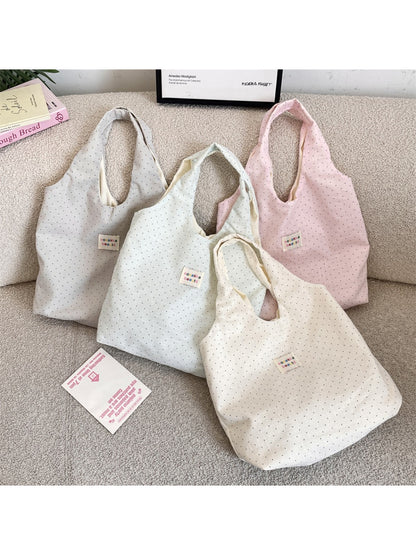 Cosbai soft polka dot shoulder tote bag front view with white dots on a soft fabric
