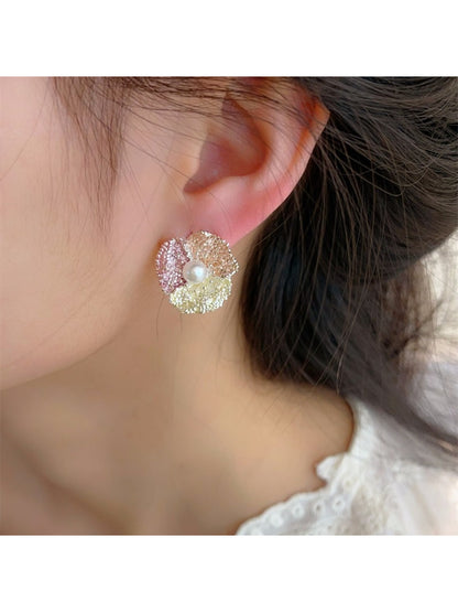 Pair of pastel-colored flower stud earrings with gold-tone backing
