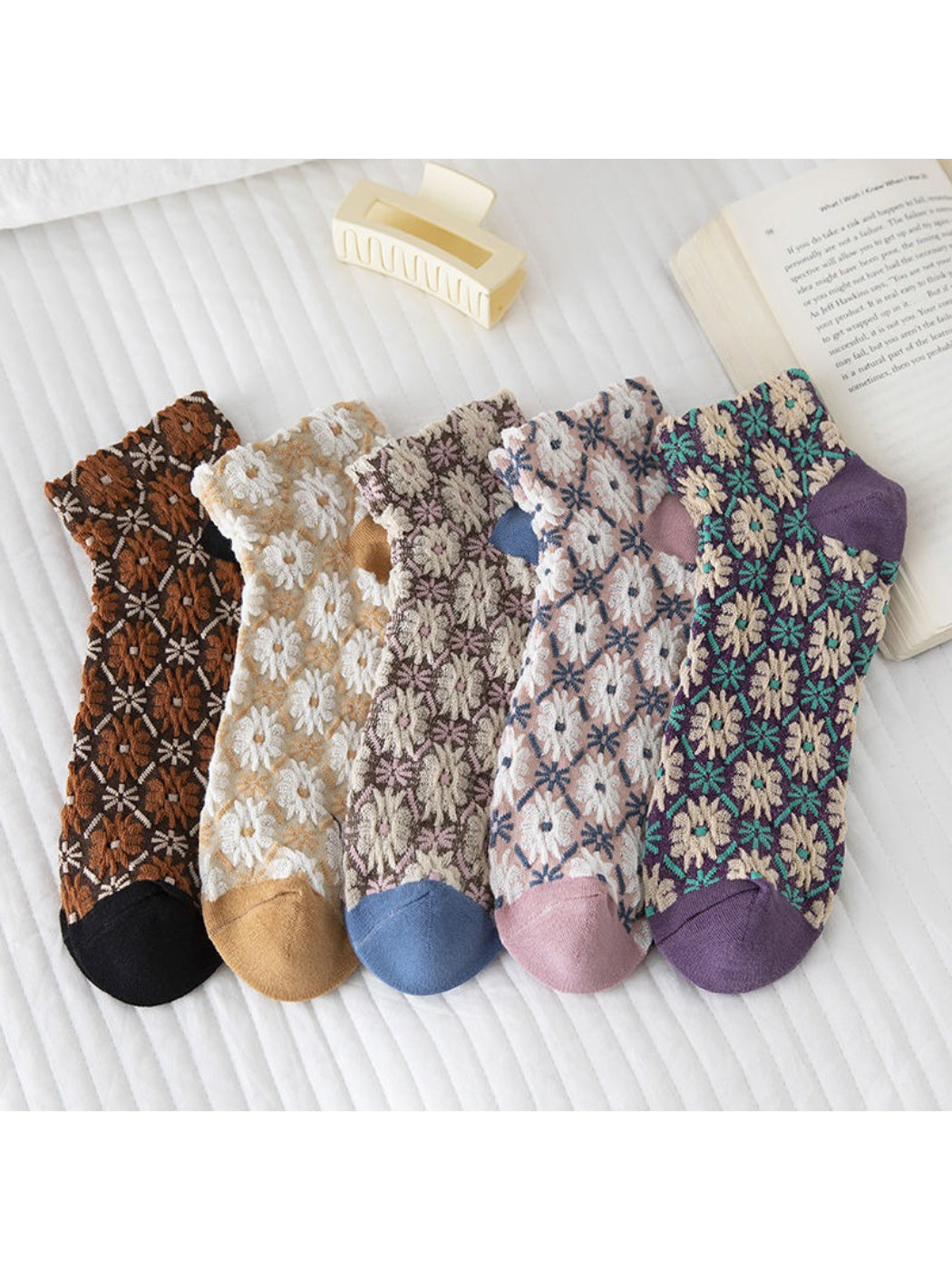 Pair of Rufia soft knit ankle socks with delicate flower pattern in pastel colors