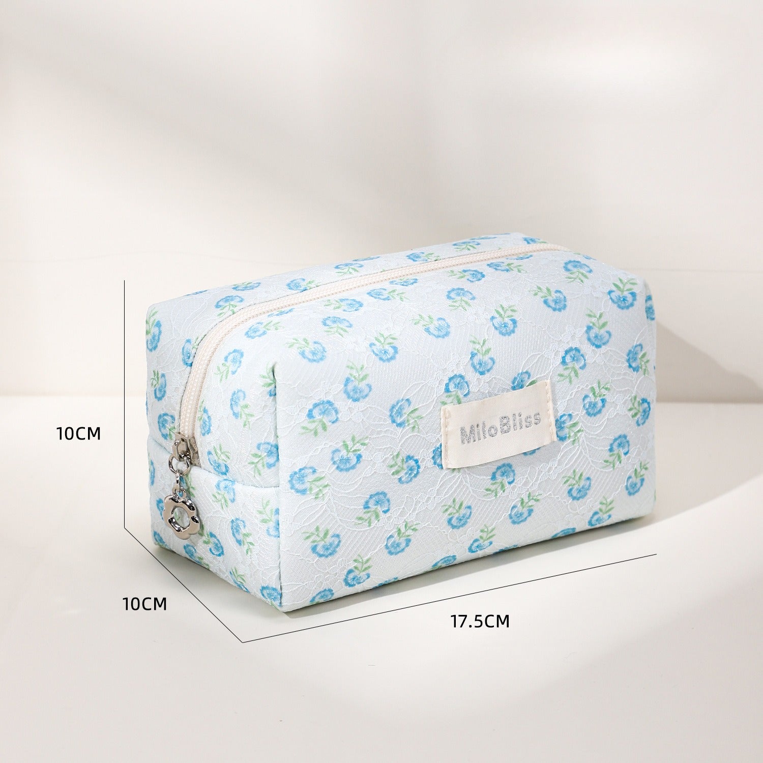 Cosbai small floral makeup organizer shown closed with a clear view of the floral design
