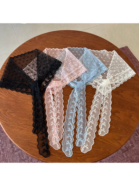 Scarvii vintage lace triangle scarf folded to show delicate lace pattern