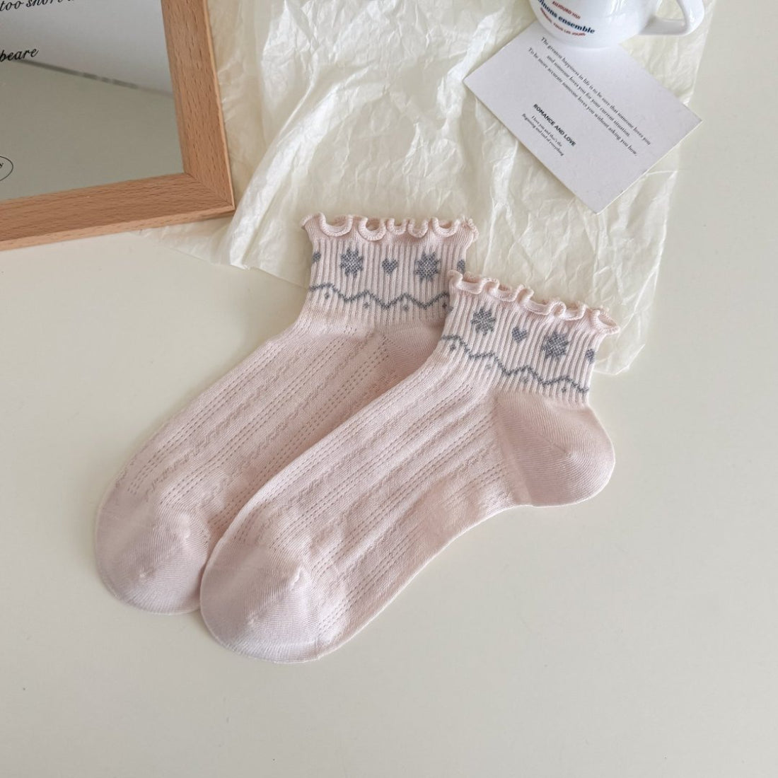 Rufia Nordic Heart Frill Crew Socks packaging with visible product label and design
