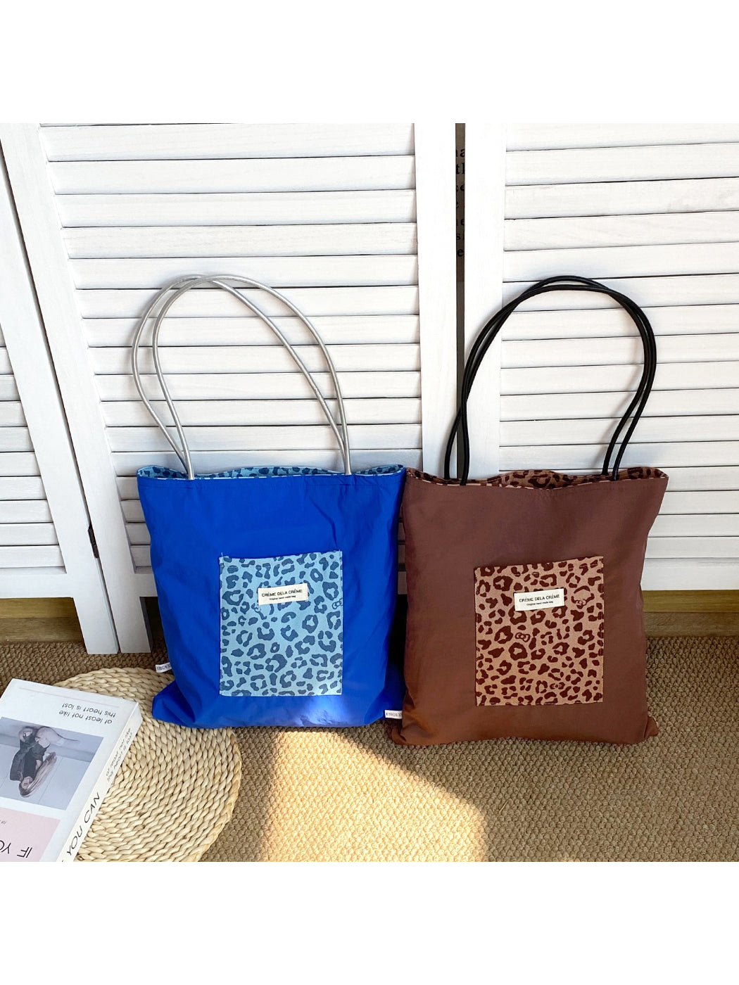 Side view of Cosbai lightweight tote bag showing slim profile and handles