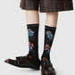 Rufia mesh floral mid-calf socks displayed on mannequin legs highlighting floral mesh design