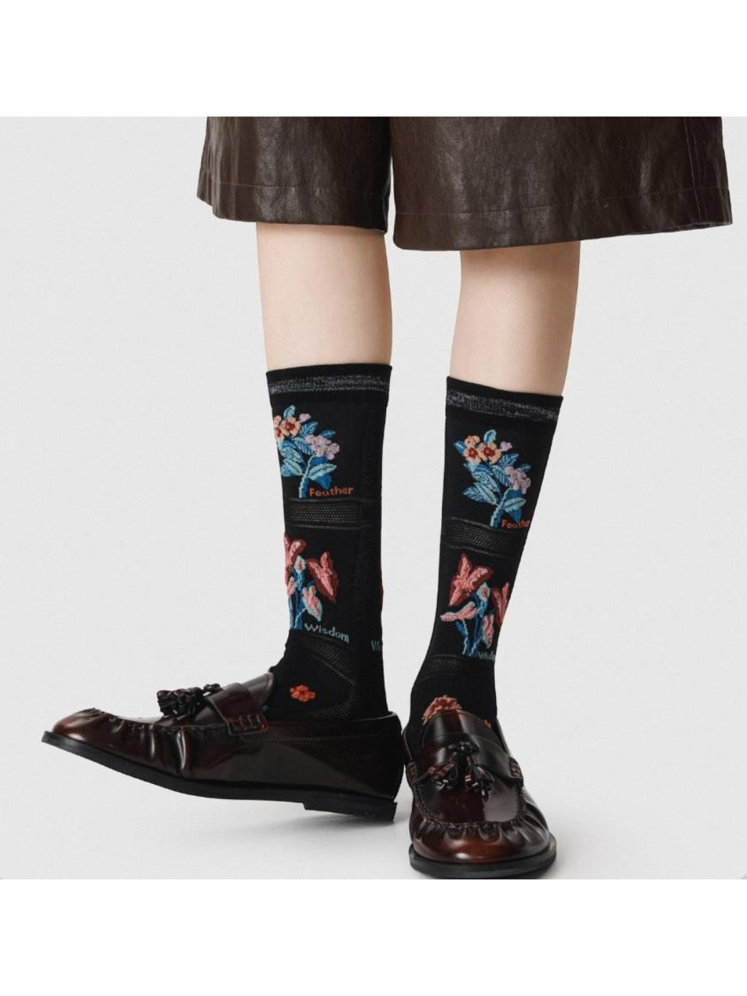 Rufia mesh floral mid-calf socks displayed on mannequin legs highlighting floral mesh design