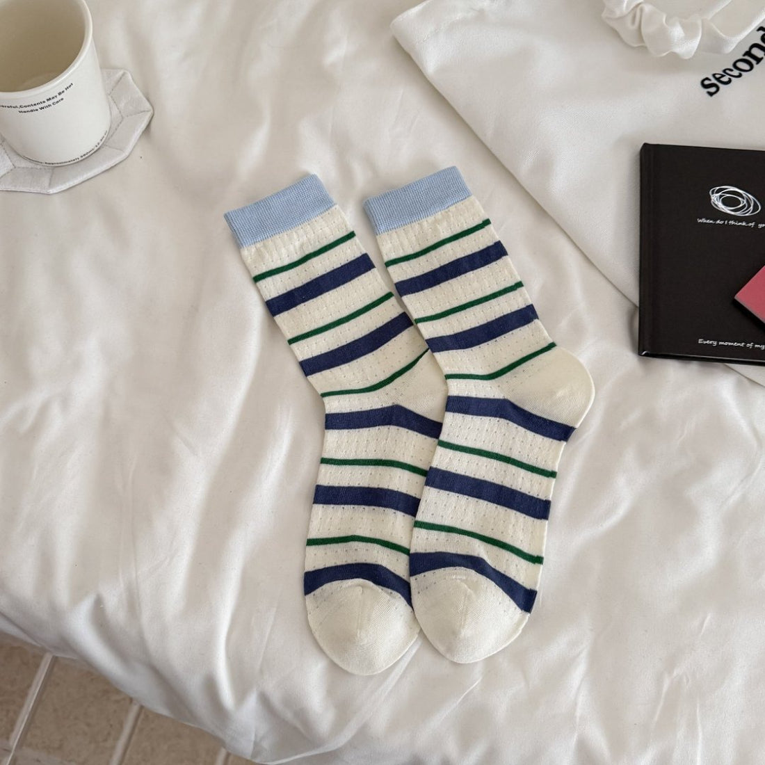 Top view of Rufia soft flecked knit crew socks showing ribbed cuff design
