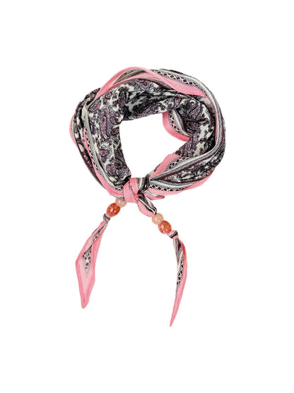 Model wearing Scarvii Paisley Bead Triangle Scarf styled around the neck