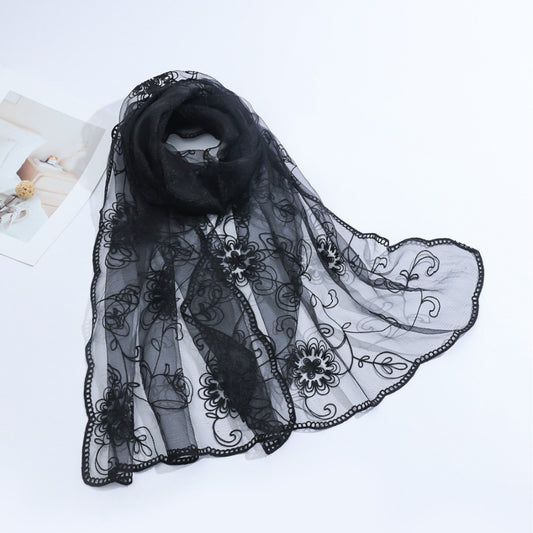 Lightweight sheer floral mesh scarf draped on a white background