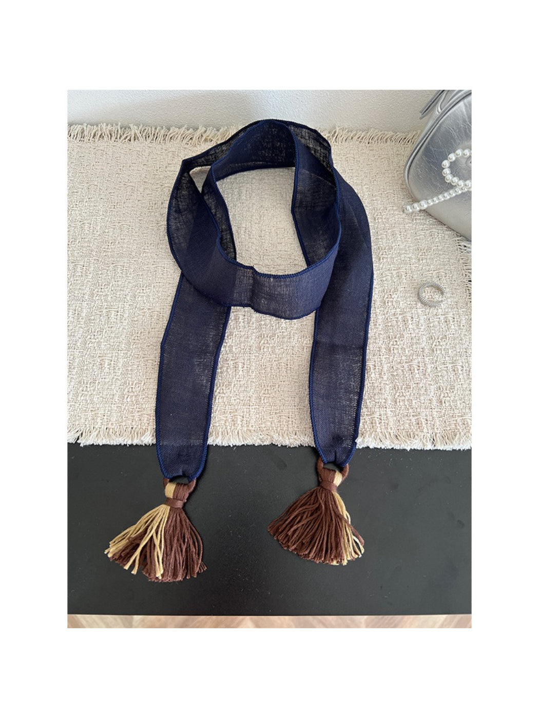 Model demonstrating different ways to wear Scarvii boho tassel skinny scarf