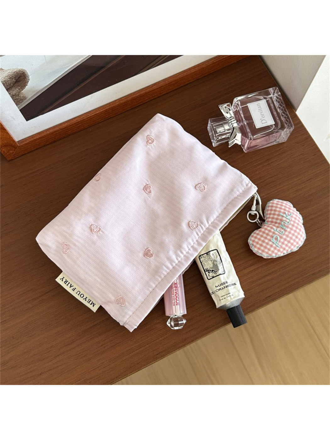 Cosbai soft cosmetic bag folded flat with heart design visible