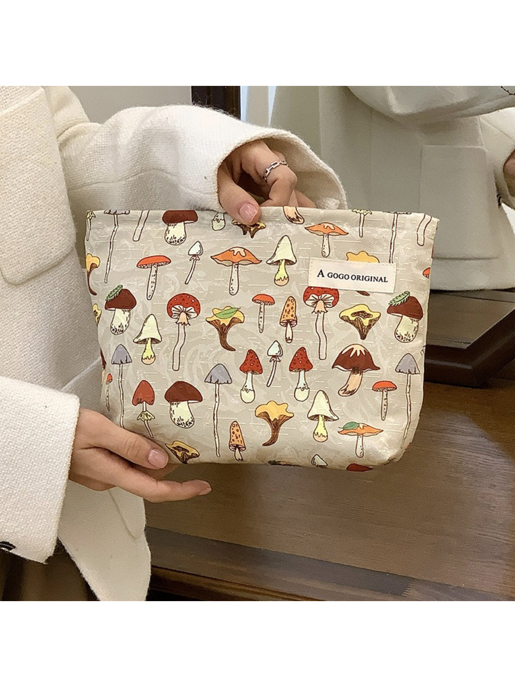 Close-up of forest mushroom pattern featuring various mushrooms on Cosbai cosmetic bag