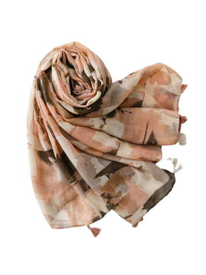 Scarvii abstract brushstroke scarf draped over a chair showcasing full pattern