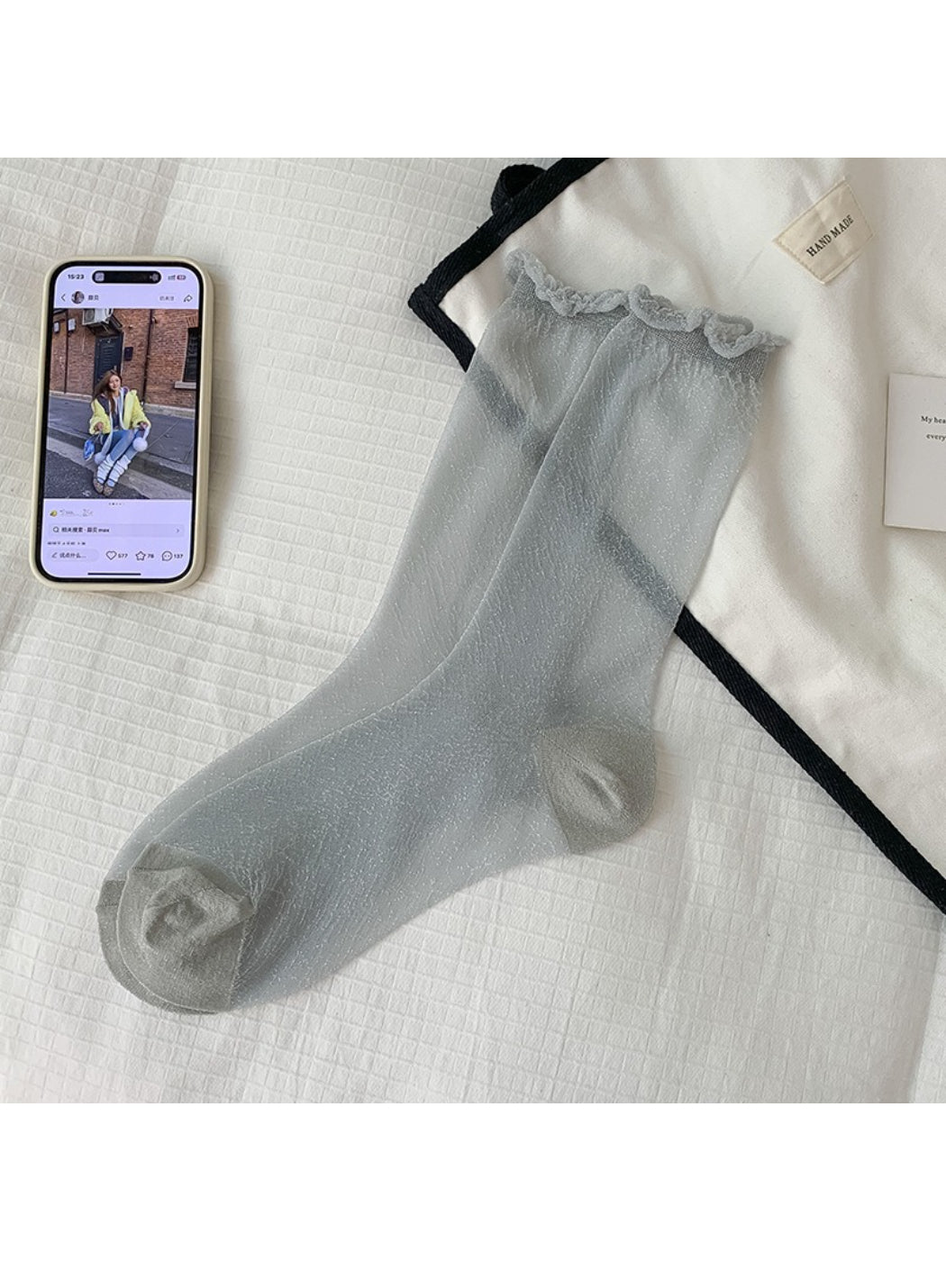 Model wearing Rufia soft sparkle crew socks with rolled-up jeans