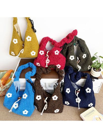 Cosbai floral knit drawstring shoulder bag in cream with multicolor flower patterns