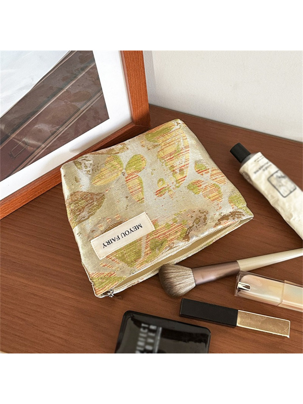 Side view of Cosbai vintage inspired floral makeup bag with fabric texture