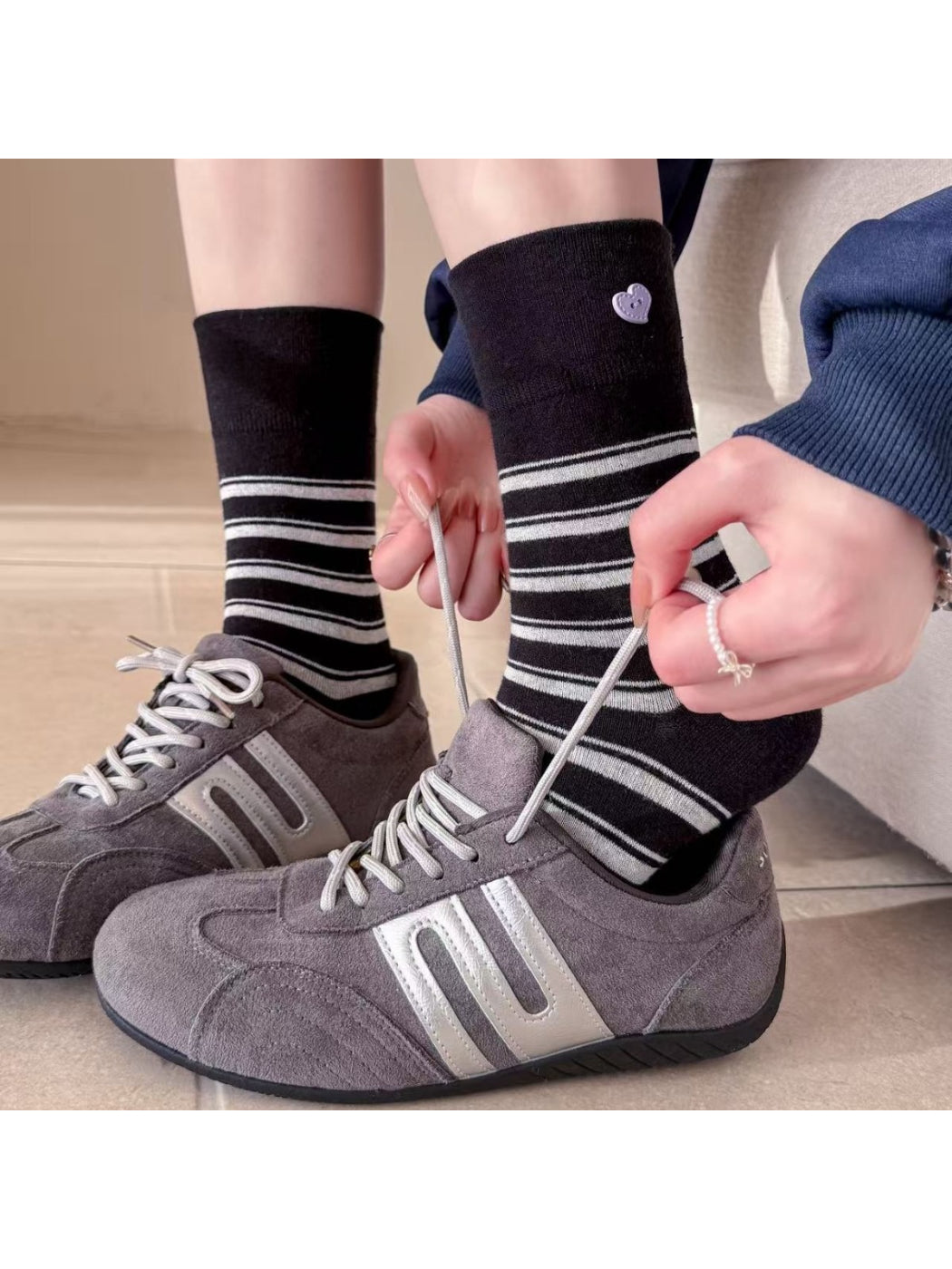 Pair of Rufia Stripe Heart mid-calf socks displayed side by side with visible stripes and hearts