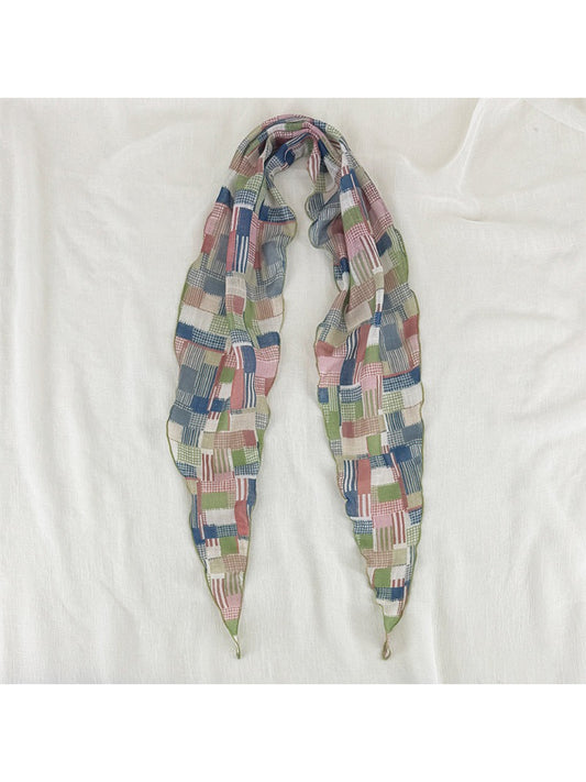 Scarvii vintage patchwork skinny scarf in mixed earthy tones displayed flat