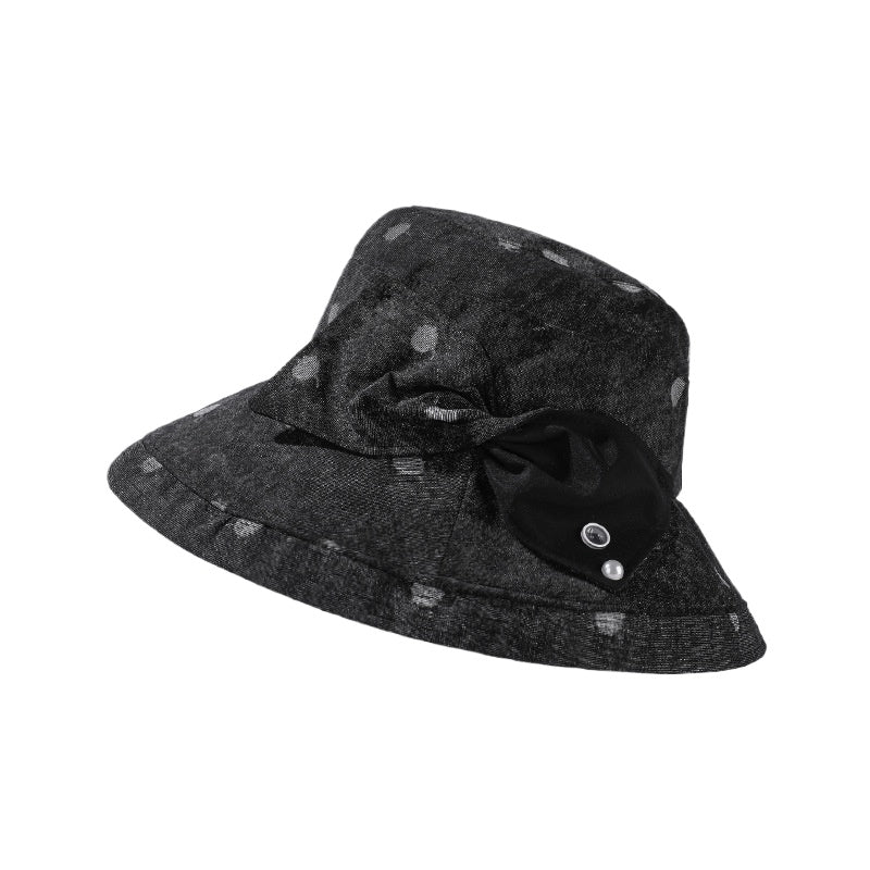 Close-up of bow on Haila polka dot brim hat with visible stitching