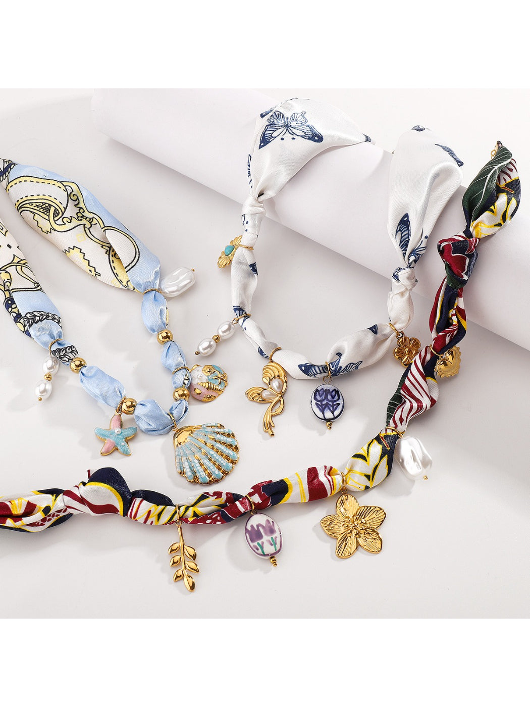Model wearing Neckit Botanical Charm fabric necklace styled with casual outfit